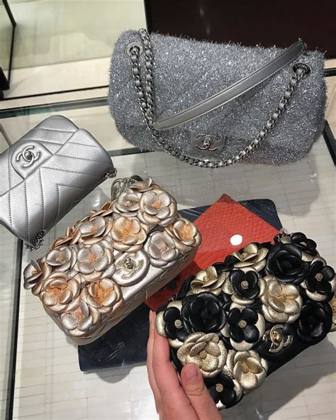 chanel drawstring camellia bag|chanel camellia brooches.